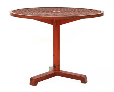 Lot 671 - A red painted and perforated metal garden table