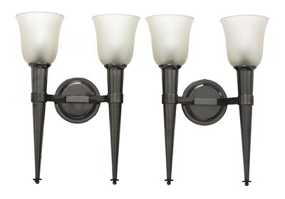 Lot 624 - A pair of French glass and gunmetal finish wall lights