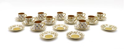 Lot 301 - A collection of Limoges coffee cups and saucers