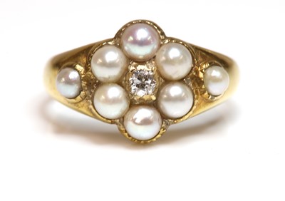 Lot 161 - A late Victorian diamond and split pearl cluster ring, c.1900