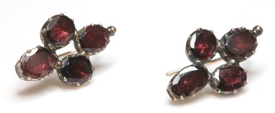 Lot 11 - A pair of Georgian flat cut, foiled garnet, quatrefoil earrings
