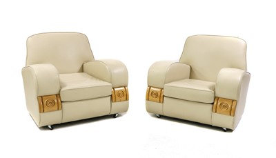 Lot 371 - A pair of Art Deco cream leather tank armchairs