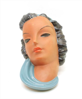 Lot 299 - A Goldscheider terracotta wall mask