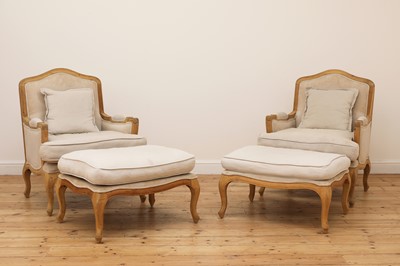 Lot 490 - A pair of blonde oak fauteuils