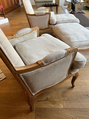 Lot 490 - A pair of blonde oak fauteuils