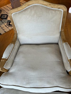 Lot 490 - A pair of blonde oak fauteuils
