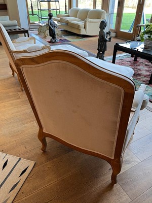 Lot 490 - A pair of blonde oak fauteuils