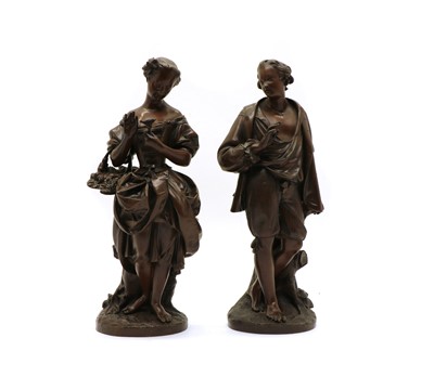 Lot 334 - A pair of late 19th century French bronze figures of a lady and gallant