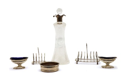 Lot 38 - A silver wine coaster