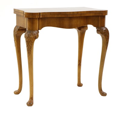 Lot 319 - A George I style figured walnut card table