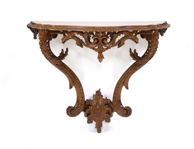 Lot 317 - A Chippendale style carved mahogany console table