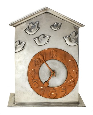 Lot 203 - A rare Liberty Tudric pewter and copper mantel clock
