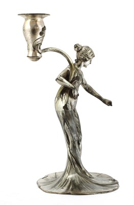 Lot 104 - A WMF silvered pewter figural candlestick