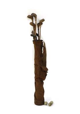 Lot 221 - A set of wooden  shafted golf clubs