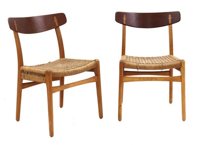 Lot 484 - A pair of 'CH23' teak dining chairs