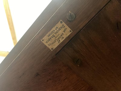 Lot 190 - An oak revolving bookcase