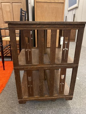 Lot 190 - An oak revolving bookcase