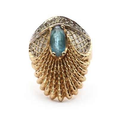 Lot 1256 - A gold aquamarine and diamond 'Luna' ring, by Erté