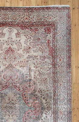 Lot 765 - A Persian silk carpet