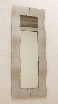 Lot 380 - An Italian textured 'Wave' aluminium mirror
