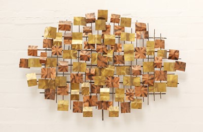 Lot 655 - A brass and copper wall sculpture