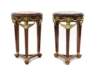 Lot 500 - A near pair of Empire-style mahogany and gilt-metal gueridons
