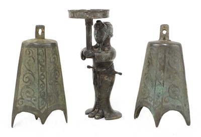 Lot 305 - A Chinese bronze candlestick