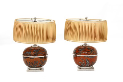 Lot 553 - A pair of ceramic table lamps