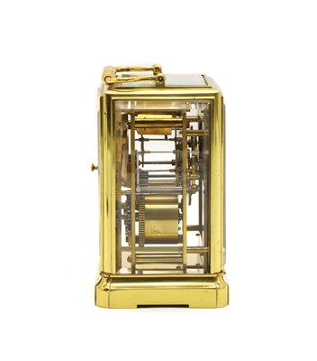 Lot 135 - A late 19th century French brass carriage clock
