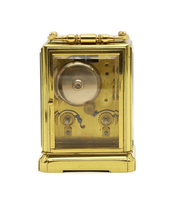 Lot 135 - A late 19th century French brass carriage clock