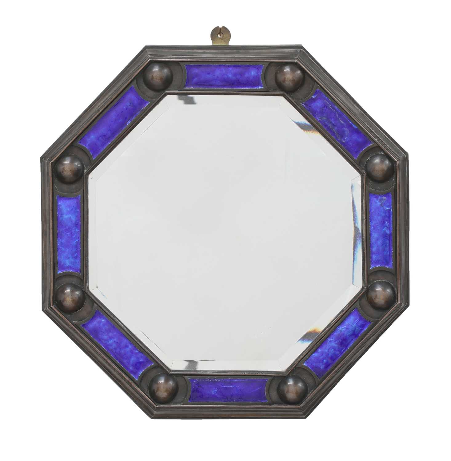 Lot 154 - An Arts and Crafts cast bronze octagonal mirror