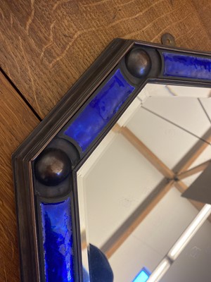 Lot 154 - An Arts and Crafts cast bronze octagonal mirror