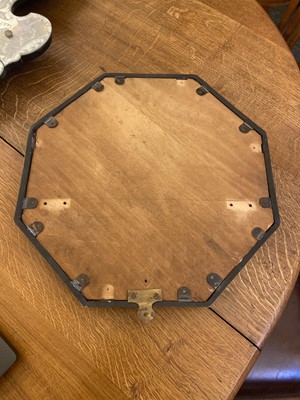 Lot 154 - An Arts and Crafts cast bronze octagonal mirror