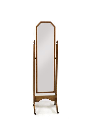 Lot 451 - An Arts & Crafts oak cheval mirror