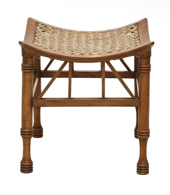 Lot 121 - An oak Thebes stool