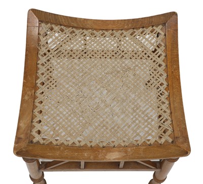 Lot 121 - An oak Thebes stool