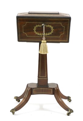 Lot 325 - A Regency brass and rosewood teapoy