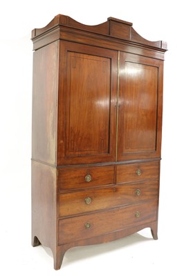 Lot 299 - A mahogany inlaid linen press