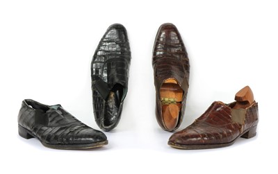 Lot 133 - A pair of John Lobb black crocodile leather slip-on shoes