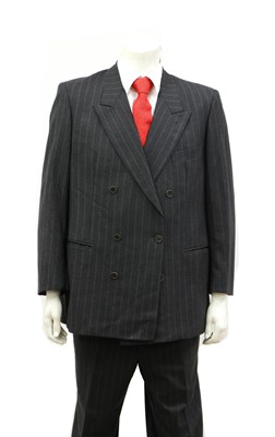 Lot 144 - A dark blue double-breasted suit