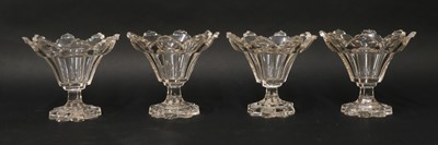 Lot 214 - A set of four cut-glass bonbonnières