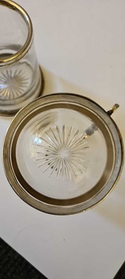 Lot 25 - A pair of Victorian silver mounted glass mugs