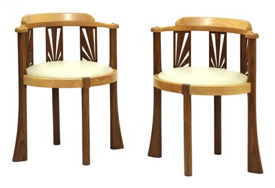 Lot 232 - A pair of sycamore and Indian rosewood armchairs