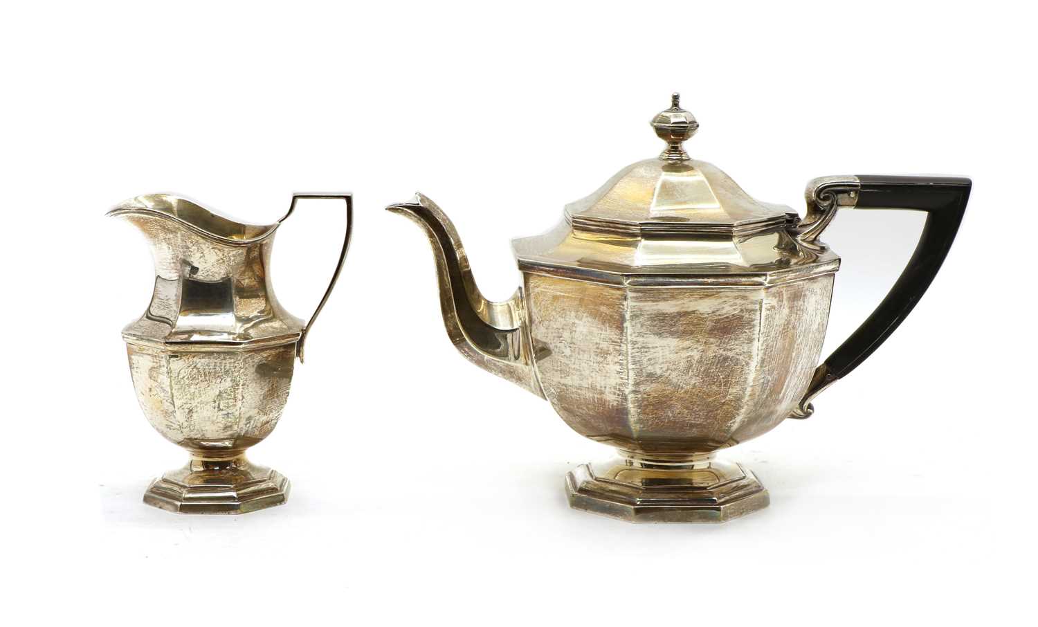 Lot 1 - A Mappin and Webb silver teapot and cream jug
