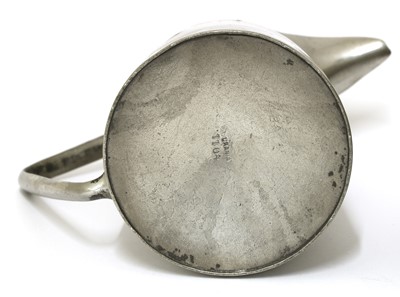 Lot 160 - An Arts and Crafts pewter jug