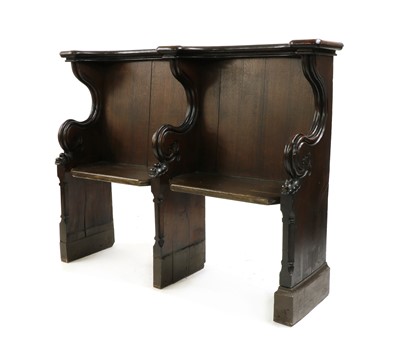 Lot 543 - A Victorian oak double-seated choir stool