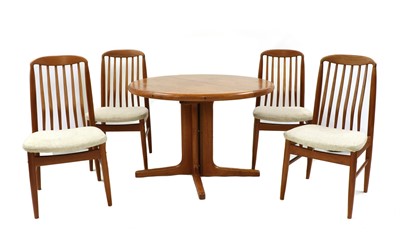 Lot 493 - A Danish teak dining suite
