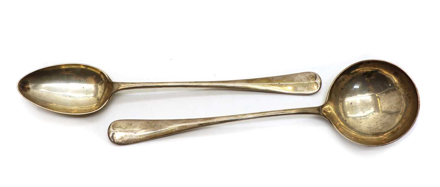 Lot 17 - A Hanoverian pattern silver ladle and basting spoon by Walker & Hall
