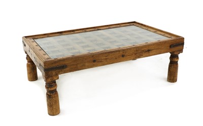 Lot 505 - An Indian hardwood coffee table