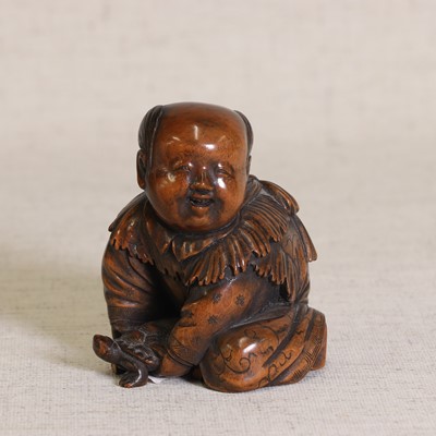 Lot 374 - A Japanese boxwood okimono